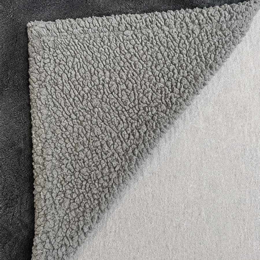 The CouplesBlanket folded back, showing the dry surface underneath